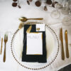 gold allure cutlery, gold rimmed glassware and gold beaded glass charger plate