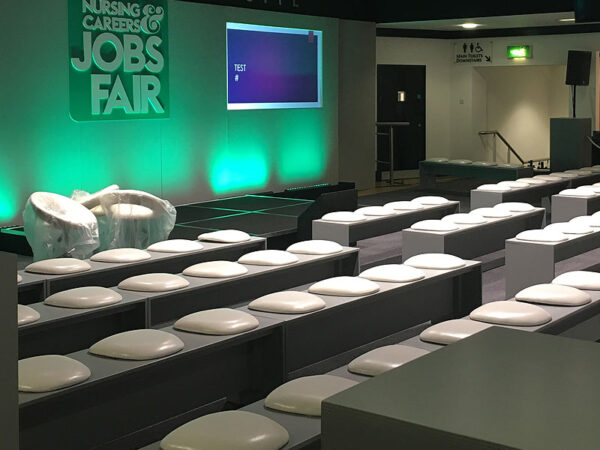 grey seminar benches with faux leather white seat pads