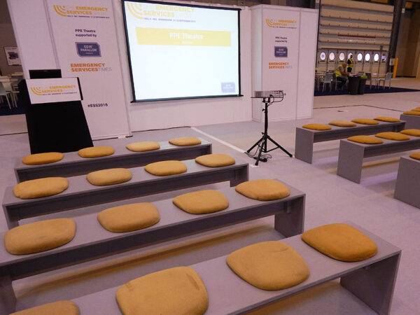 grey seminar benches with gold seat pads for exhibition and conference delegates
