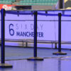 black retracting belt barriers at the international cycling velodrome in manchester