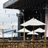 wooden picnic benches and parasols at lytham music festival