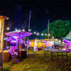 patio heater and parasol, alongside a table tennis table at a summer festival