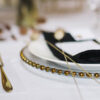 gold beaded glass charger plate and allure gold fork