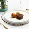 fine dining desert with gold beaded glass charger plate and allure gold cutlery