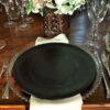 ellipse cutlery with black mattone plate on silver beaded glass charger plate