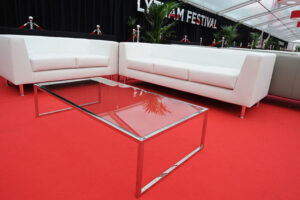 Combine leather sofas with glass coffee tables for a stylish look