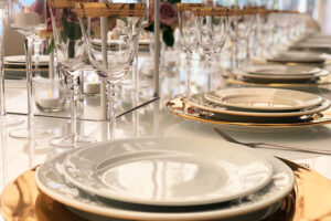 Gold wide rim charger plates complete elegant table settings