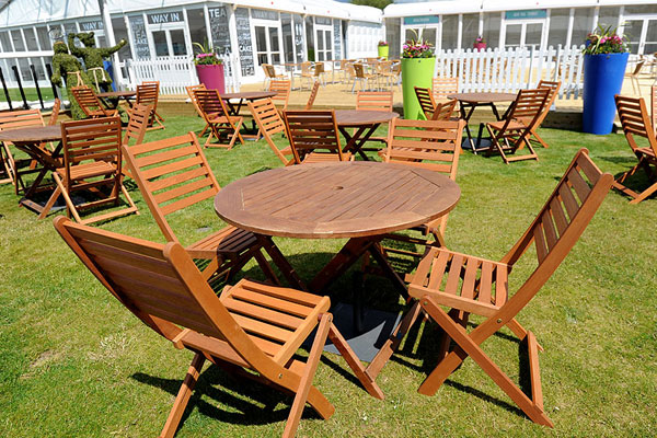 Hardwood furniture hire for lawned areas
