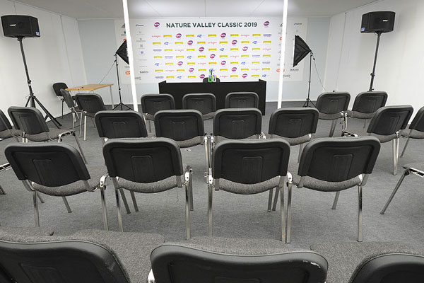 Charcoal linking ISO chairs for press conferences