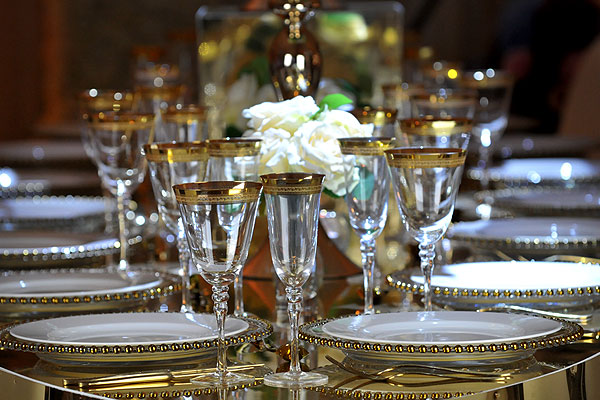 Luxury gold tableware helps to define your event