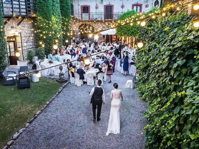 Affordable wedding reception ideas with festoon lights and evening atmosphere